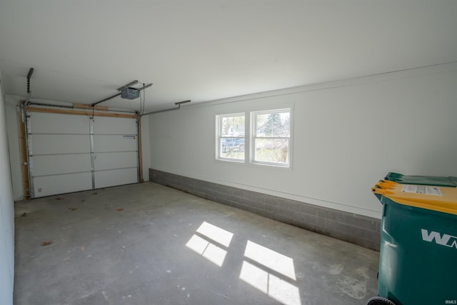 garage featuring a garage door opener