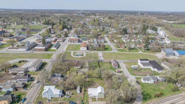 birds eye view of property with a residential view