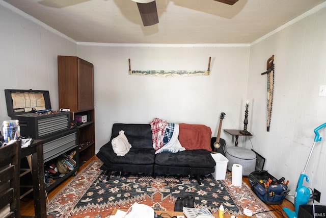 121 E Water St, Linden, IN 47955 - living area with ornamental molding, ceiling fan, vaulted ceiling, and wood finished floors