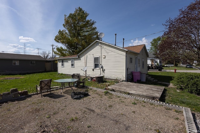 121 E Water St, Linden, IN 47955 - rear view of house with a yard