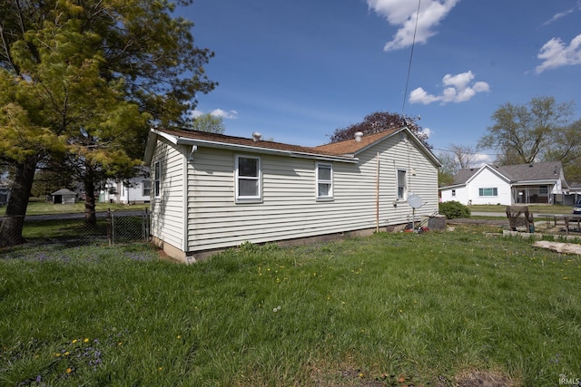 121 E Water St, Linden, IN 47955 - view of property exterior with a lawn and fence