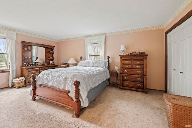 bedroom featuring a closet and carpet