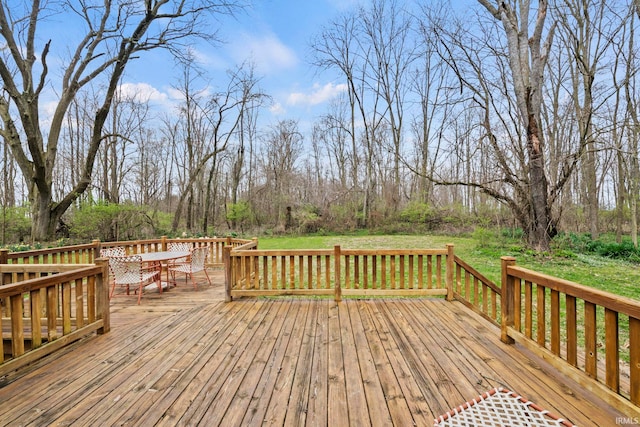 deck featuring outdoor dining area