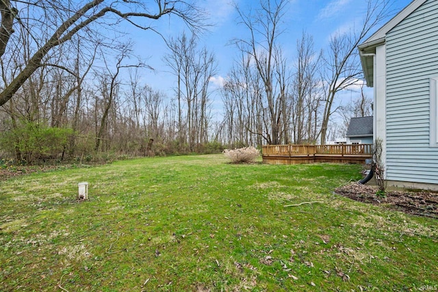 view of yard featuring a deck