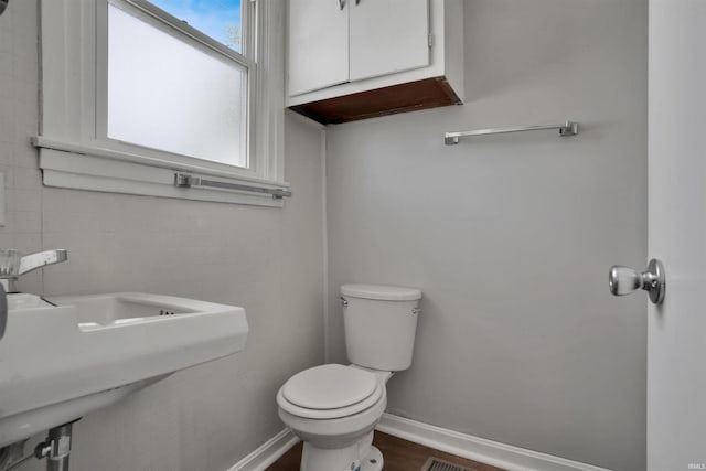 314 S Welworth Ave, Evansville, IN 47714 - half bath with baseboards, toilet, and a sink