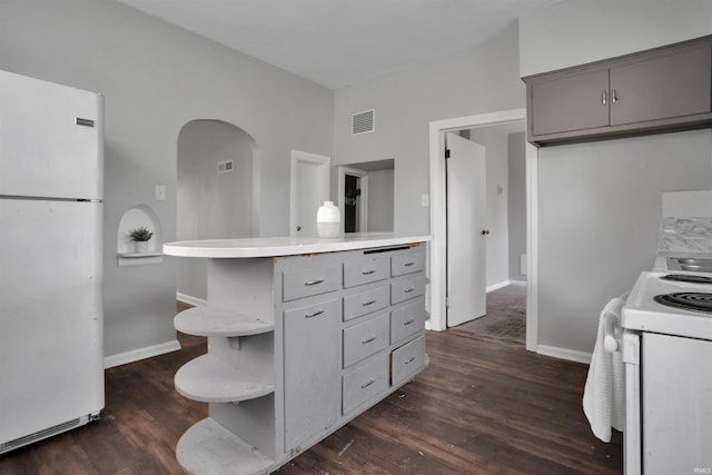 314 S Welworth Ave, Evansville, IN 47714 - kitchen with open shelves, visible vents, dark wood finished floors, white appliances, and gray cabinets