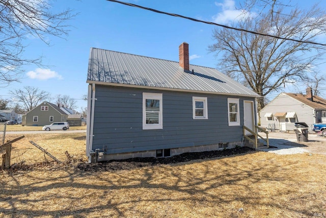 4121 Smith St, Fort Wayne, IN 46806 - back of property with a chimney and metal roof