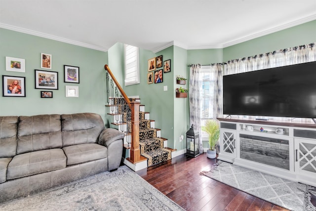 719 E Mitchell St, Kendallville, IN 46755 - living area featuring crown molding, hardwood / wood-style floors, stairway, and baseboards
