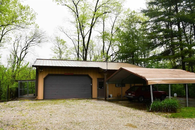 exterior space featuring a detached garage