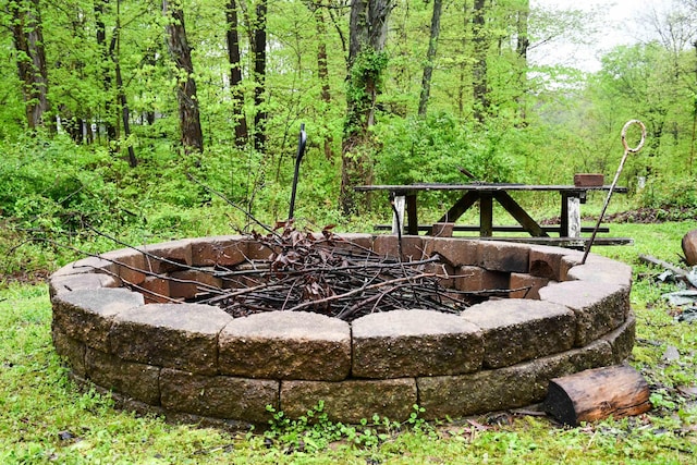 exterior details featuring a fire pit