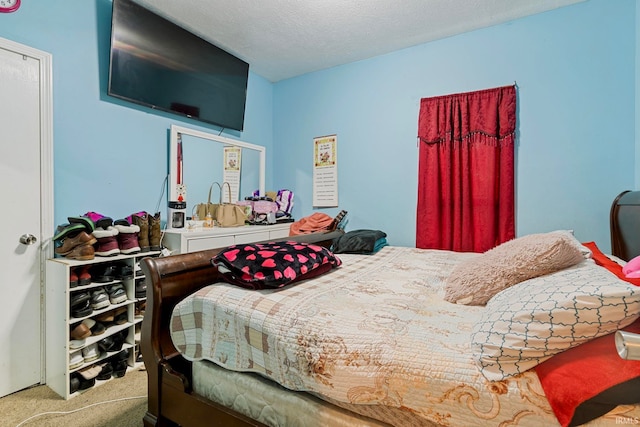 bedroom featuring carpet