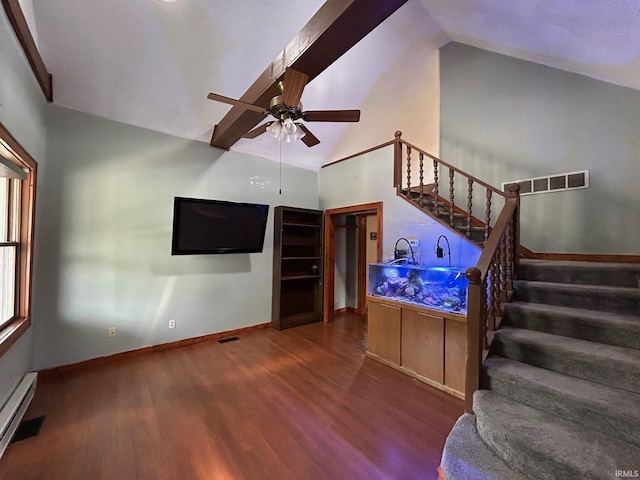 living area with stairway, a ceiling fan, wood finished floors, baseboards, and a baseboard radiator