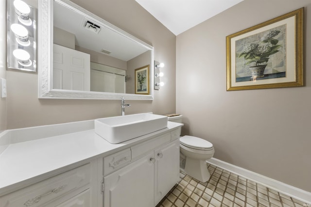 1711 Old Plank Rd, Newburgh, IN 47630 - bathroom with toilet, vanity, and baseboards