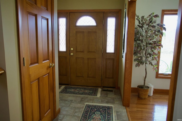 entrance foyer featuring baseboards