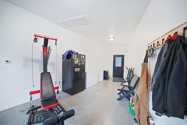 workout area with attic access