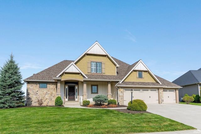 craftsman inspired home with driveway, stone siding, roof with shingles, a front lawn, and a garage