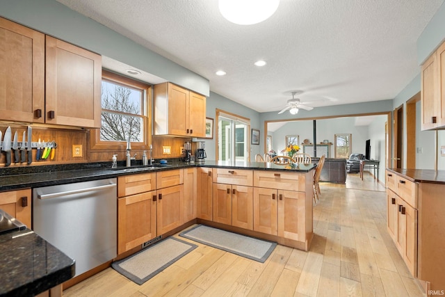 1808 County Road 18th Rd, Waterloo, IN 46793 - kitchen featuring a textured ceiling, light wood-type flooring, dishwasher, a sink, and a peninsula