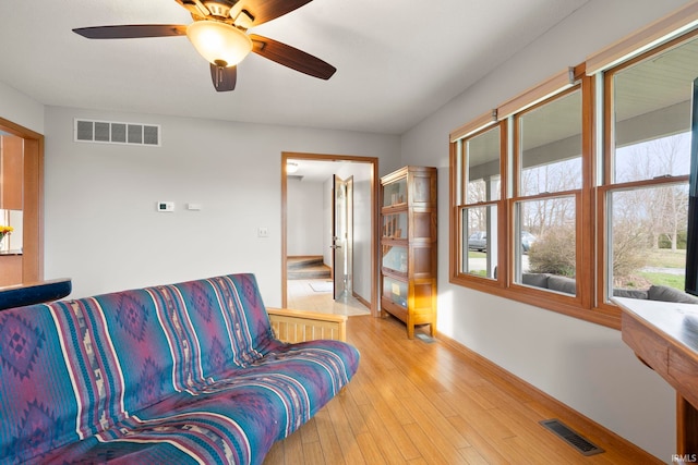 1808 County Road 18th Rd, Waterloo, IN 46793 - living area with baseboards, ceiling fan, wood finished floors, and visible vents