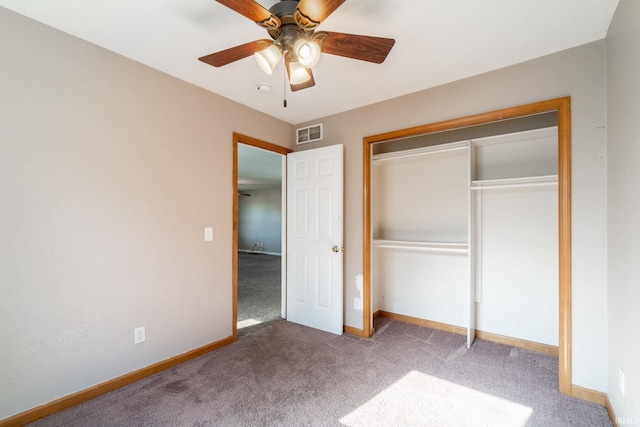 unfurnished bedroom with carpet flooring, a closet, ceiling fan, visible vents, and baseboards
