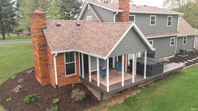 6021 N Timberline Dr, Bloomington, IN 47404 - rear view of property with a chimney, a deck, a yard, central air condition unit, and roof with shingles