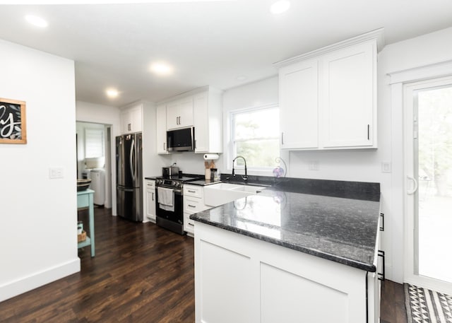 6021 N Timberline Dr, Bloomington, IN 47404 - kitchen featuring white cabinetry, stainless steel appliances, dark wood finished floors, and a sink