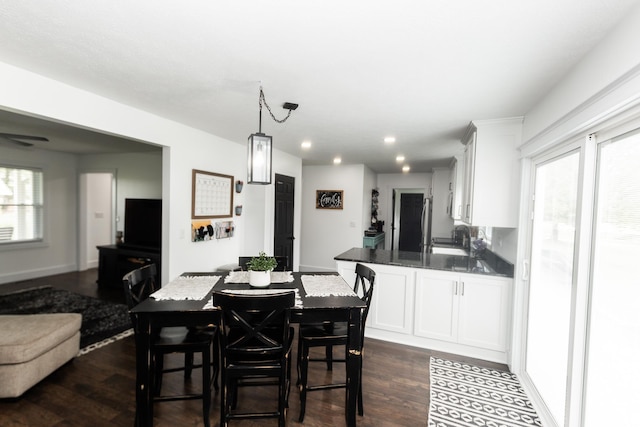 6021 N Timberline Dr, Bloomington, IN 47404 - dining space featuring recessed lighting, dark wood-style flooring, and a healthy amount of sunlight