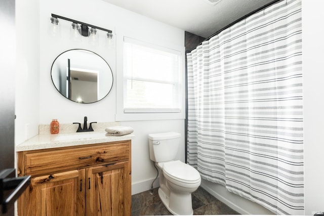 6021 N Timberline Dr, Bloomington, IN 47404 - full bath featuring vanity, toilet, and baseboards
