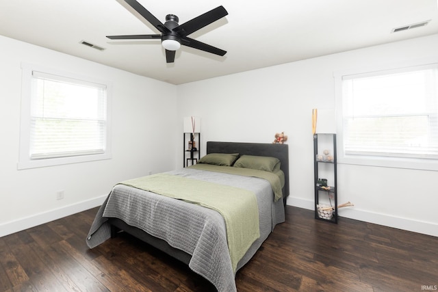 6021 N Timberline Dr, Bloomington, IN 47404 - bedroom with wood finished floors, visible vents, and baseboards
