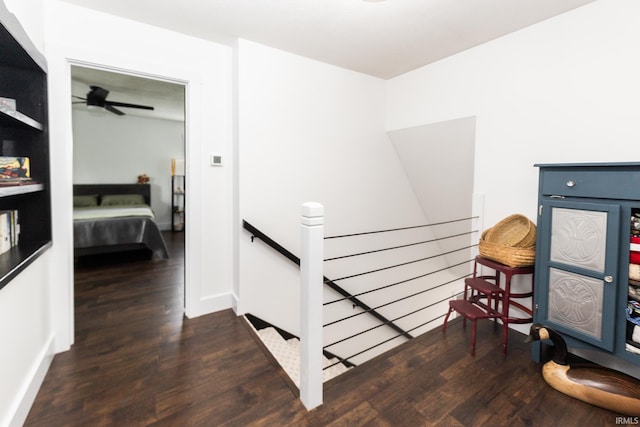 6021 N Timberline Dr, Bloomington, IN 47404 - stairway featuring wood finished floors and a ceiling fan