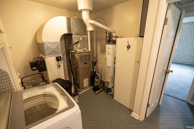 utility room featuring washer / dryer and gas water heater