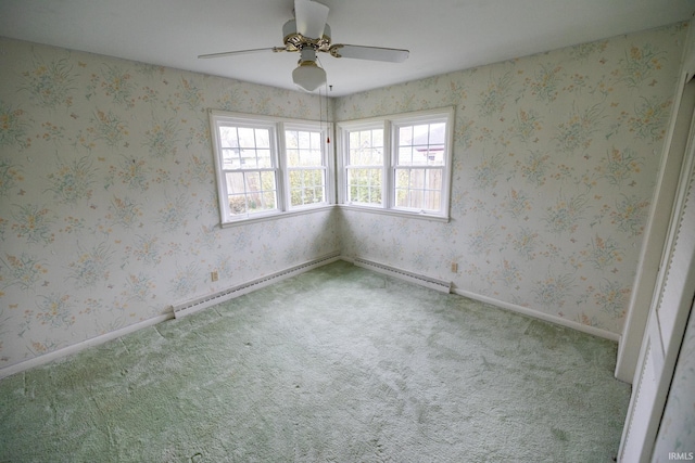 unfurnished room featuring carpet flooring, a wealth of natural light, and ceiling fan