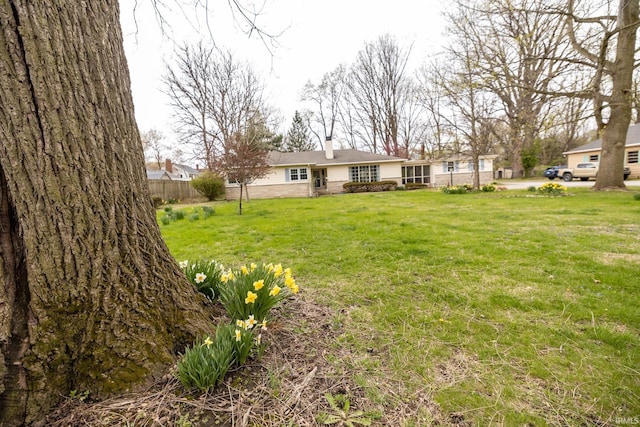 view of yard with fence