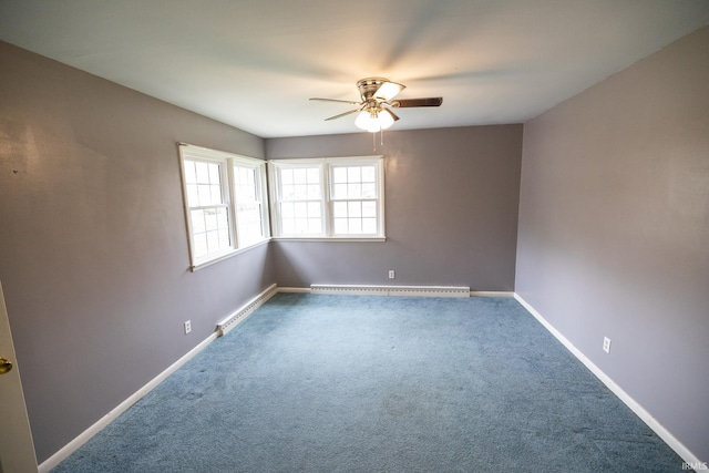 spare room featuring a ceiling fan, baseboards, baseboard heating, carpet floors, and a baseboard radiator