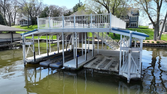 view of dock featuring a water view and boat lift