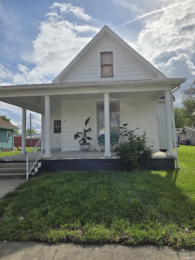 1225 Main St, Vincennes, IN 47591 - bungalow-style house featuring covered porch and a front yard