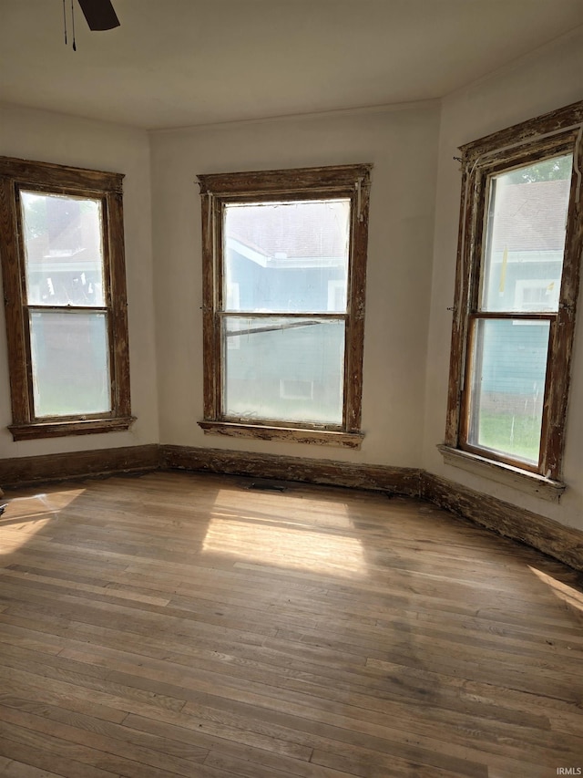 1225 Main St, Vincennes, IN 47591 - unfurnished room with a ceiling fan and wood finished floors