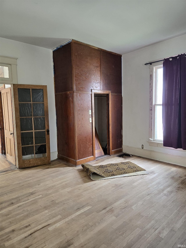 1225 Main St, Vincennes, IN 47591 - unfurnished living room with light wood-type flooring
