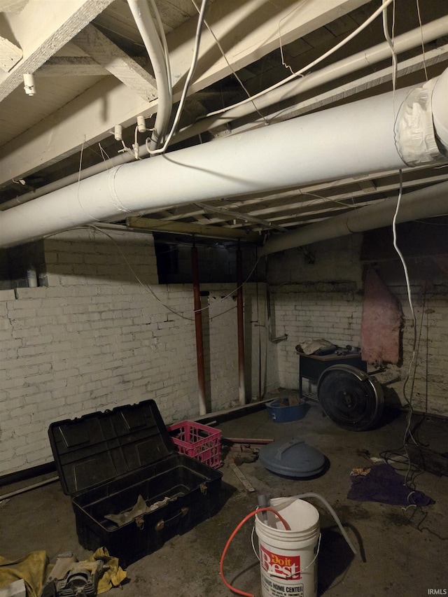 1225 Main St, Vincennes, IN 47591 - unfinished below grade area with brick wall