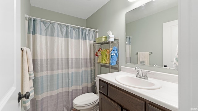 1905 Waynedale Dr, Garrett, IN 46738 - bathroom with toilet, a shower with curtain, and vanity