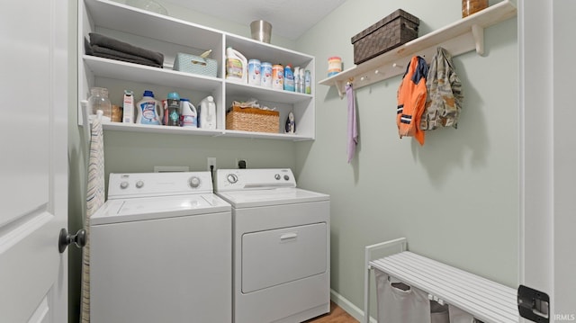 1905 Waynedale Dr, Garrett, IN 46738 - washroom with light wood-type flooring, laundry area, and washing machine and dryer