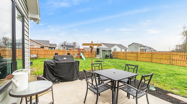 1905 Waynedale Dr, Garrett, IN 46738 - view of patio / terrace with outdoor dining space, area for grilling, and a fenced backyard