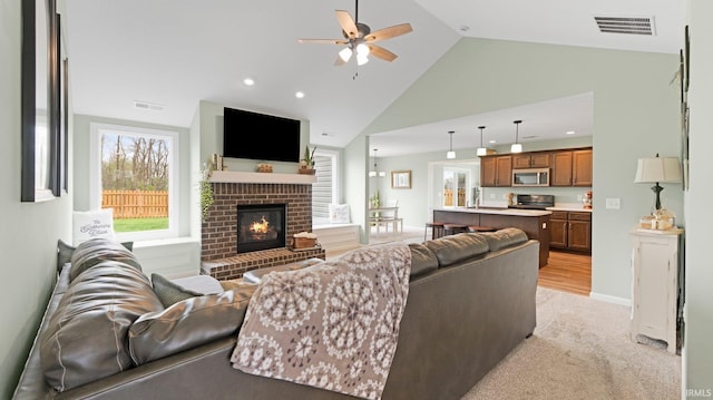 1905 Waynedale Dr, Garrett, IN 46738 - living area featuring a brick fireplace, recessed lighting, visible vents, and ceiling fan