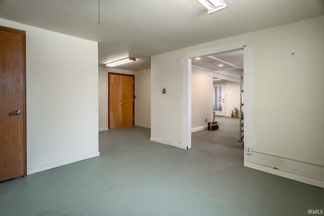 basement featuring recessed lighting