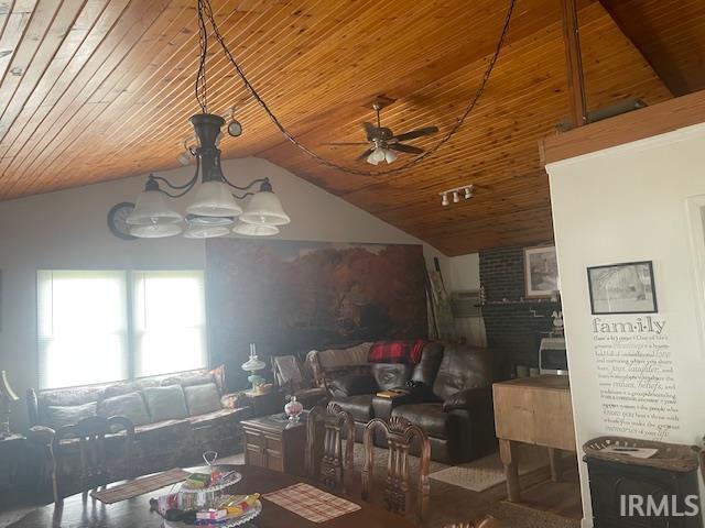 living area with wooden ceiling, ceiling fan, and lofted ceiling