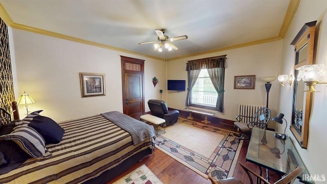 410 Riverside Dr, Jasper, IN 47546 - bedroom with hardwood / wood-style flooring, radiator, ornamental molding, and ceiling fan