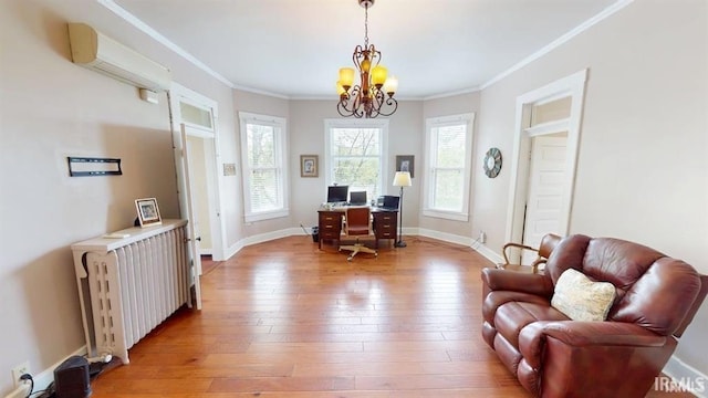 410 Riverside Dr, Jasper, IN 47546 - sitting room with a wall mounted air conditioner, an office area, light wood finished floors, a chandelier, and crown molding