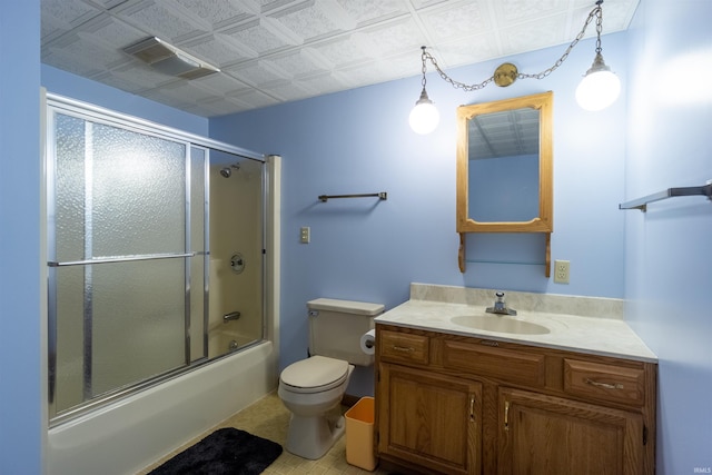 full bath with combined bath / shower with glass door, visible vents, toilet, and vanity
