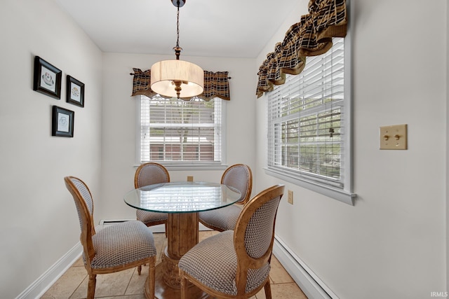 302 N Main St, Culver, IN 46511 - dining area with light tile patterned flooring and baseboards