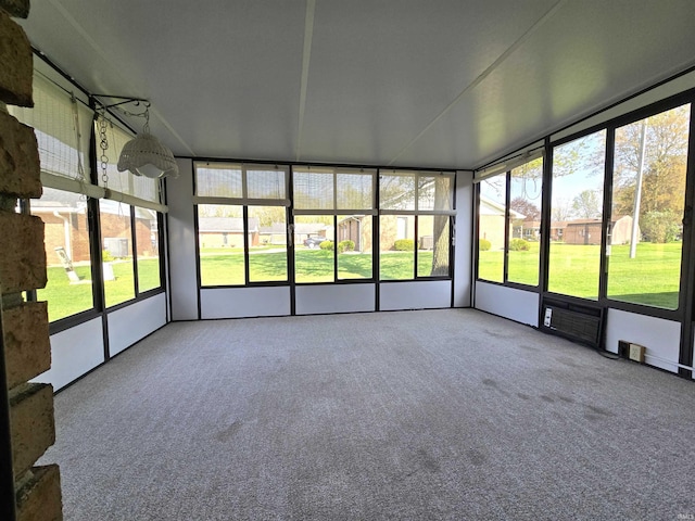 unfurnished sunroom with a healthy amount of sunlight