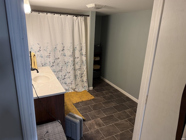 540 Fairfield Dr, Wabash, IN 46992 - full bathroom featuring tile patterned floors, visible vents, vanity, and baseboards